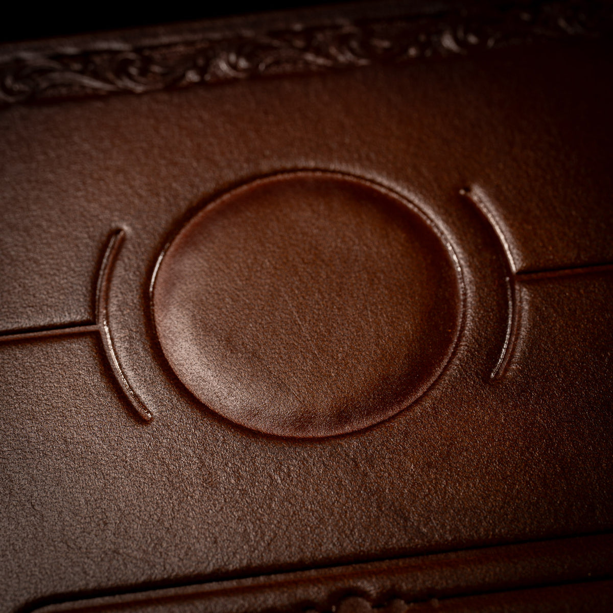 Close view of the full moon at the centre of the moon phase band on The Astro leather tarot mat