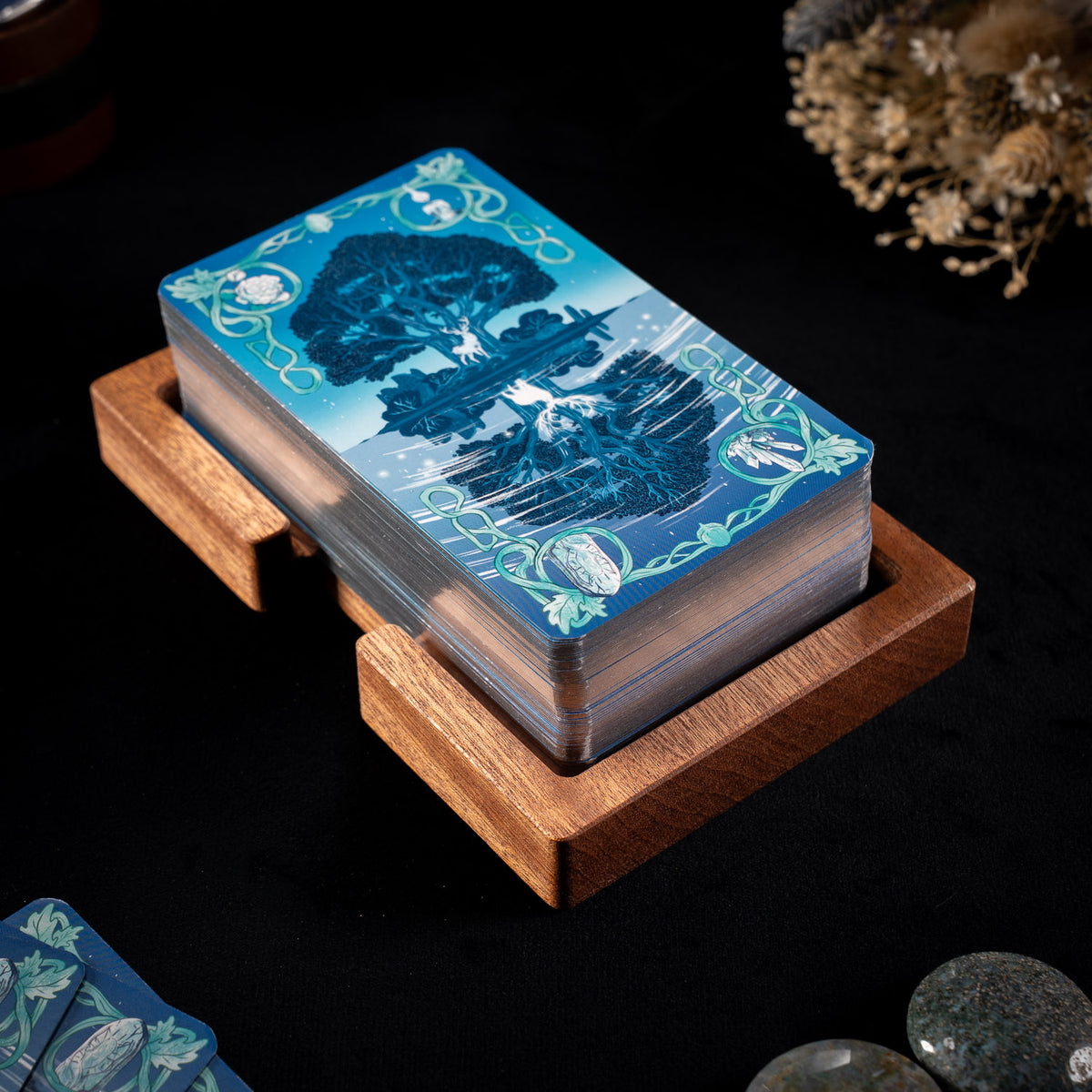 Wooden tarot deck stand with a debossed leather inlay, ready for a reading